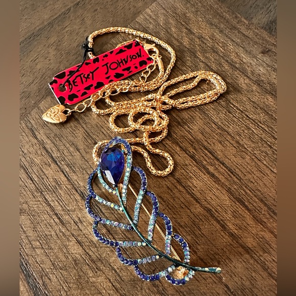 Betsey Johnson Jewelry - Betsey Johnson Blue crystal Gold tone Feather Brooch/Necklace‎ NWT